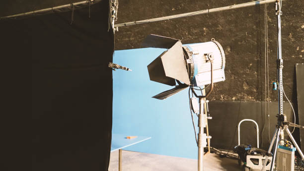 istock Blue screen backdrop and big LED studio light for movie video or film photography production 1045364708