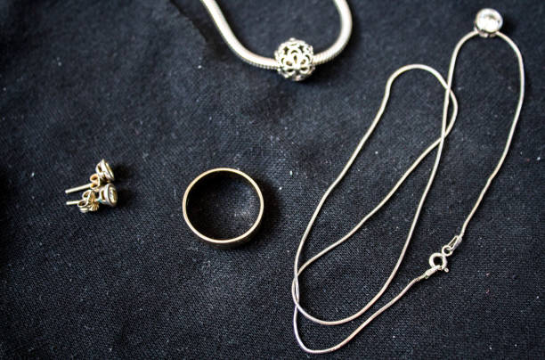 istock ring and bracelet and earrings and chain with pendant 1045369524