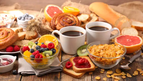 Photo of table with full healthy breakfast