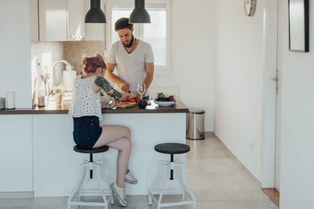 istock Couple preparing food together in the kitchen 1045382132