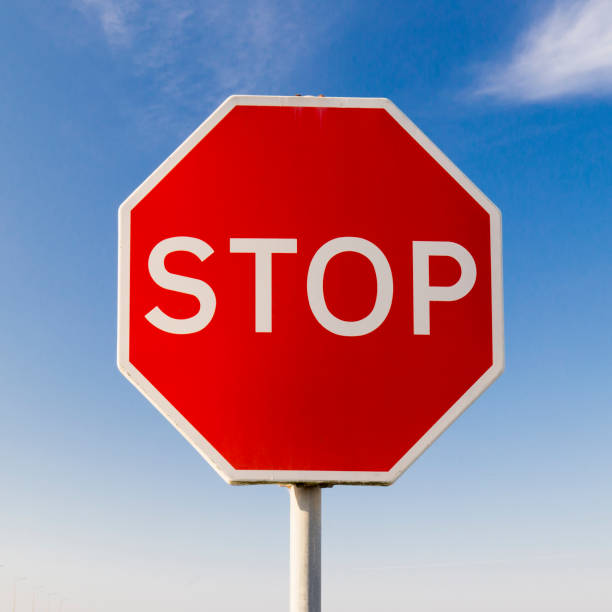 istock Stop sign for traffic against blue sky. 1045382484