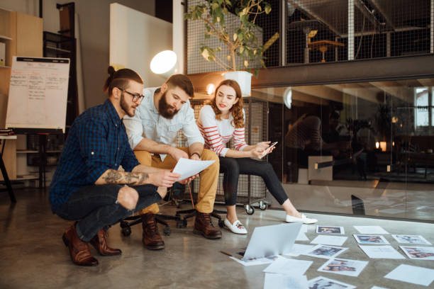 istock Team of Photographers working on a new project 1045383642