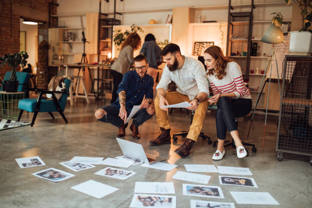 istock Team of Photographers working on a new project 1045383740