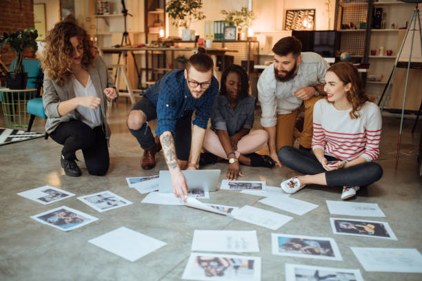 istock Team of editors working on a new magazine issue 1045383926