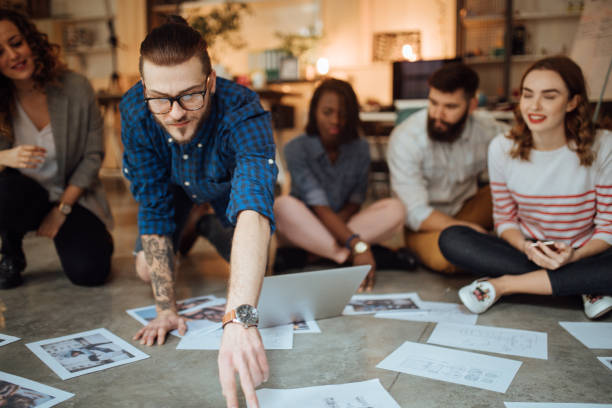 istock Team of editors working on a new magazine issue 1045384028