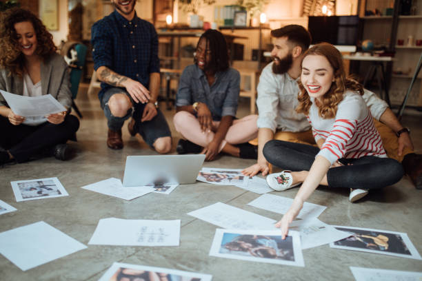 istock Team of editors working on a new magazine issue 1045384036