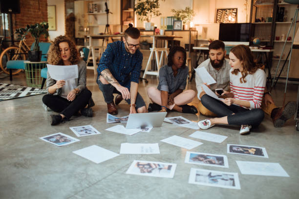 istock Team of editors working on a new magazine issue 1045384174