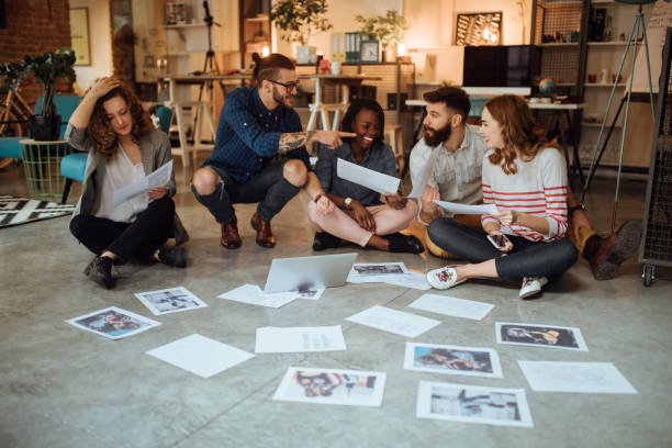 istock Team of editors working on a new magazine issue 1045384230