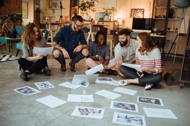 istock Team of editors working on a new magazine issue 1045384236