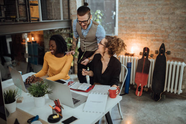 istock HR manager talking to his coworkers 1045387126