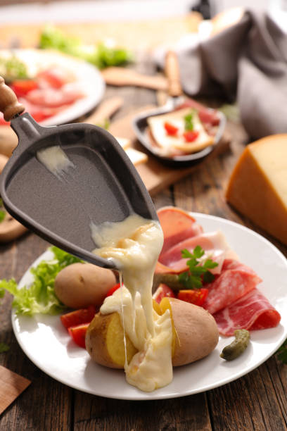 istock raclette cheese with potato and meat 1045394482