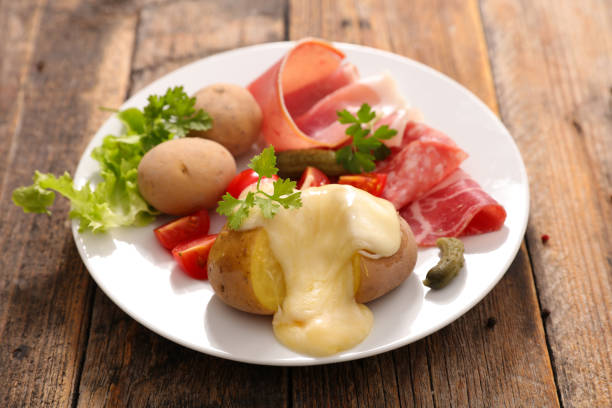 istock raclette cheese with potato and meat 1045394580