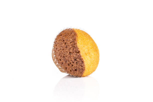 Fresh baked marble muffin isolated on white