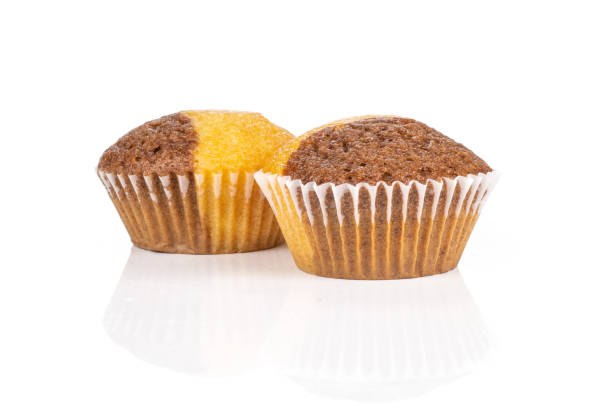istock Fresh baked marble muffin isolated on white 1045398122