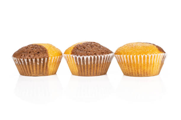 istock Fresh baked marble muffin isolated on white 1045398186