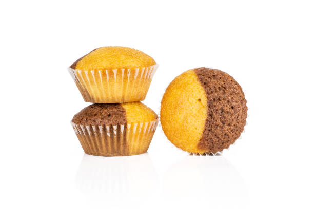 istock Fresh baked marble muffin isolated on white 1045398206