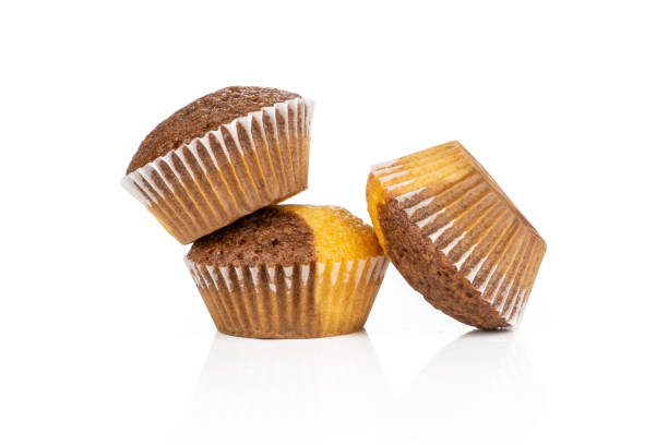 istock Fresh baked marble muffin isolated on white 1045398220