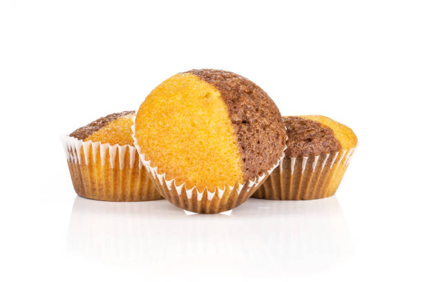 istock Fresh baked marble muffin isolated on white 1045398310