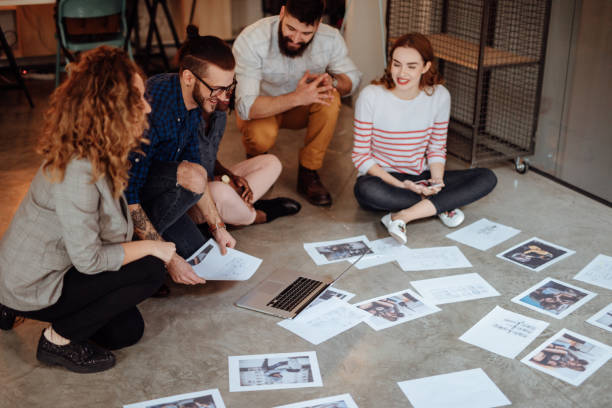 istock Team of editors picking material for new magazine 1045402450