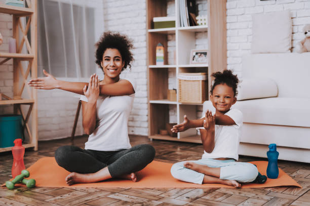 istock Girl with Mother Training in Studio Together. 1045402552