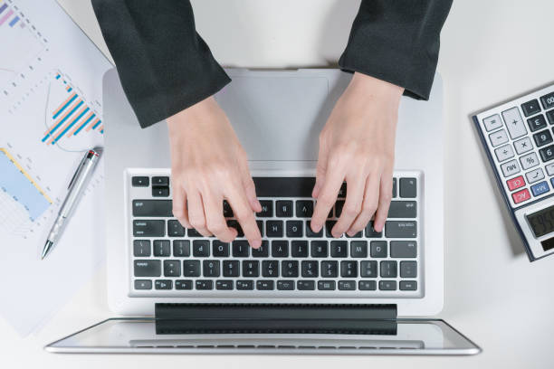 istock Accountant officer use laptop in the office 1045404020
