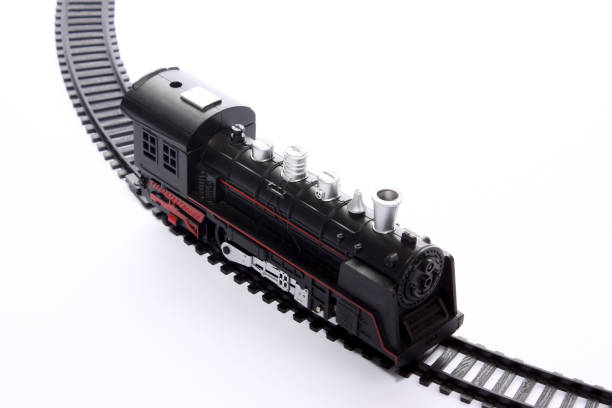 istock toy locomotive on rails 1045412952