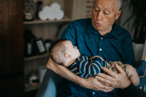 istock Baby boy with great grandfather 1045414264