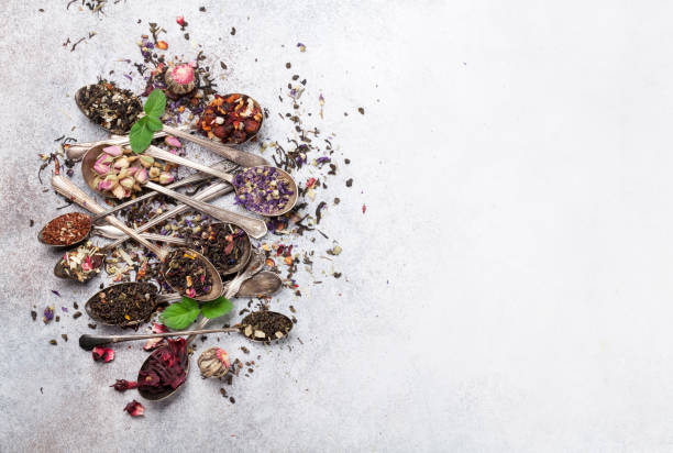 istock Various tea in spoons. Black, green and red tea 1045414376