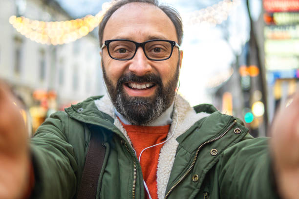 istock Man taking a selfie outdoors 1045415006