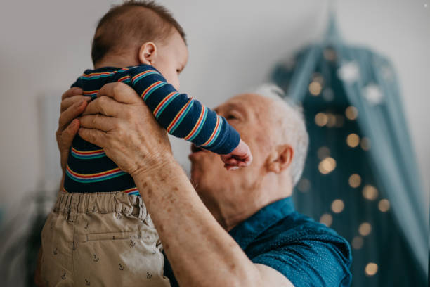 istock Grandfather playing with his grandson 1045420818