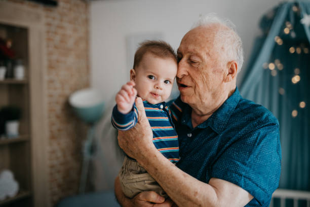istock Grandpa embracing his little grandson 1045420948