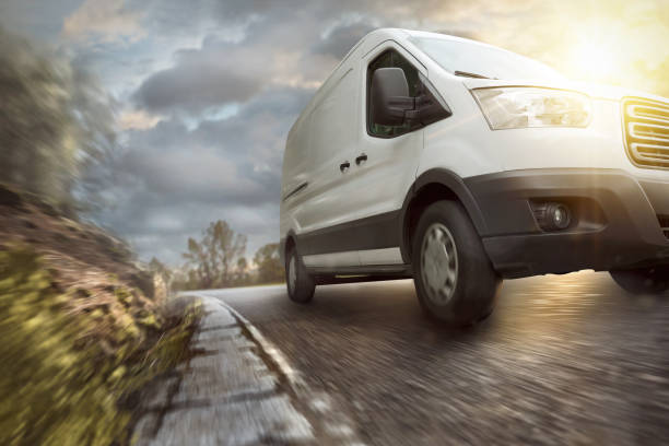 istock Delivery van on a countryside highway 1045422618