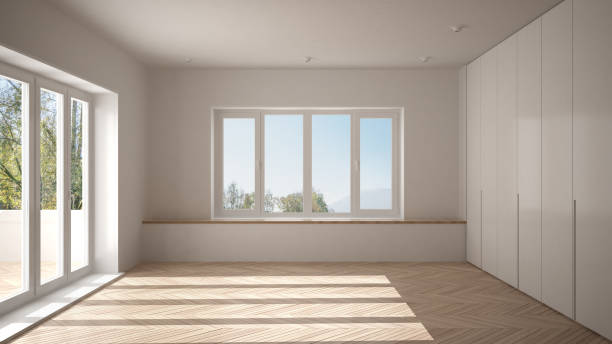 nowoczesna pusta przestrzeń z dużymi panoramicznymi oknami i drewnianą podłogą, minimalistyczna biała architektura wnętrza - loft apartment window indoors domestic room zdjęcia i obrazy z banku zdjęć