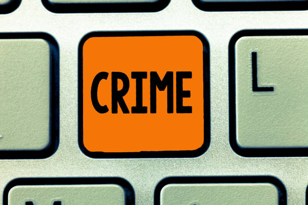 istock Handwriting text writing Crime. Concept meaning Federal Offense actions Illegal Activities punishable by Law 1045432364