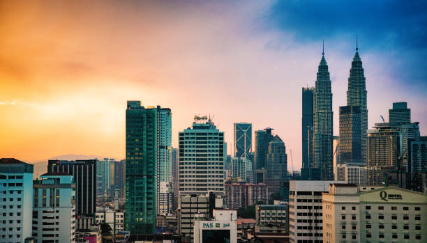 istock Kuala Lumpur Aerial panoramic skyline at sunset after rain 1045433480