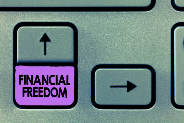 istock Handwriting text Financial Freedom. Concept meaning Having money Free from worry when it comes to cash flow 1045434018