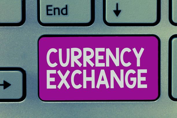 istock Handwriting text writing Currency Exchange. Concept meaning Process of changing one currency into another ForEx 1045434358