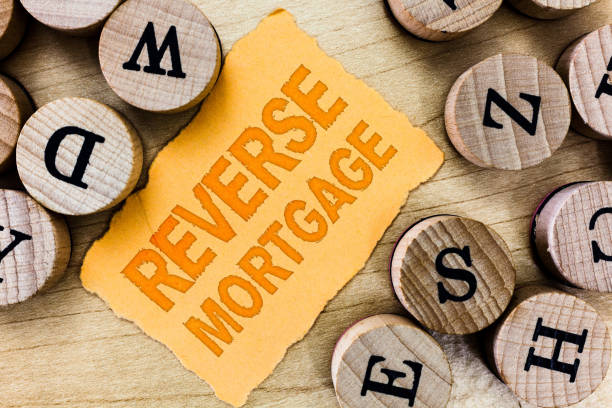 istock Handwriting text Reverse Mortgage. Concept meaning loan for seniors age above sixties and older to be returned 1045434528