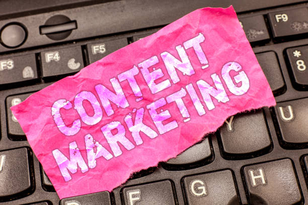 istock Writing note showing Content Marketing. Business photo showcasing Involves the creation and sharing of online material 1045434554