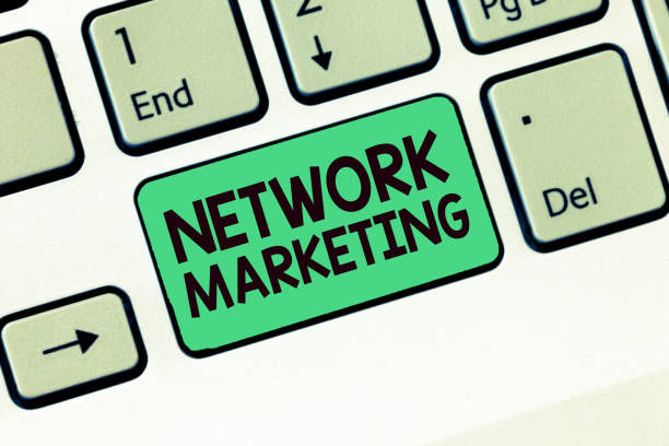 istock Writing note showing Network Marketing. Business photo showcasing Pyramid Selling Multi level of trading goods and services 1045434944
