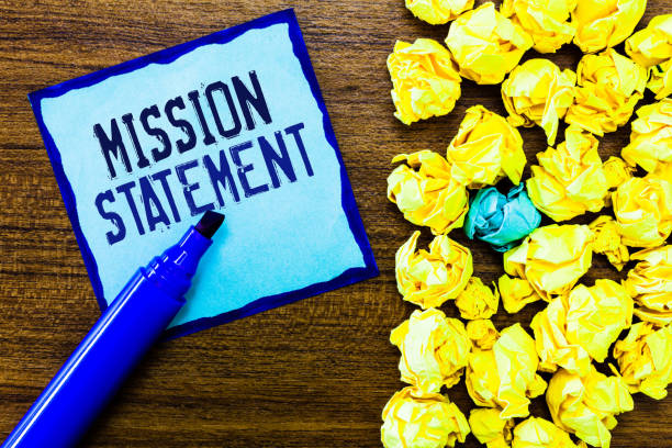istock Writing note showing Mission Statement. Business photo showcasing Formal summary of the aims and values of a company 1045435222