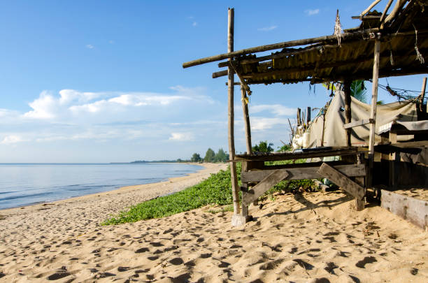 istock Beautiful tropical beach at sunny day with blue sky background 1045435584