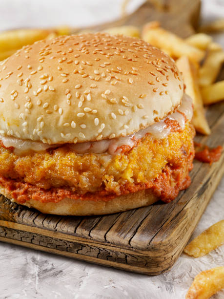 istock Chicken Parmesan Burger with Fries 1045435852
