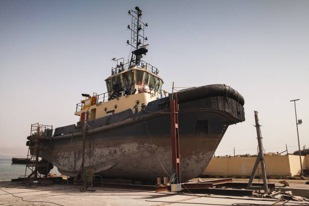 istock Old tugboat for repair at dock 1045437958