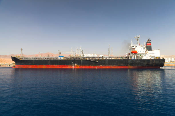 istock Industrial tanker ship loading in a port 1045438002