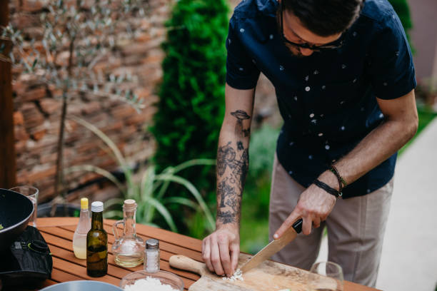 Chef cutting garlic