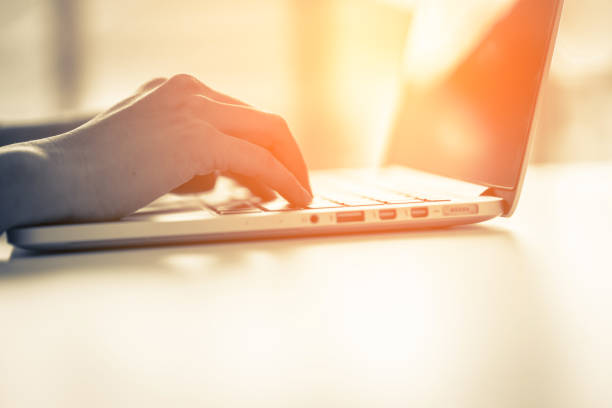 istock business working woman hand type laptop with office background 1045439554