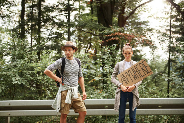 istock Portrait of young couple backpacking 1045439690