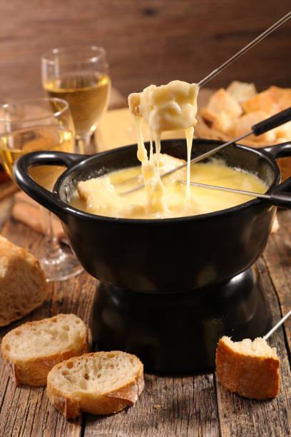 istock cheese fondue with wine and bread 1045444386