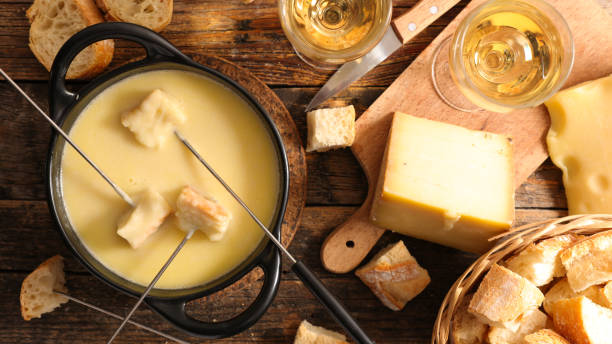 istock cheese fondue with wine and bread 1045444412